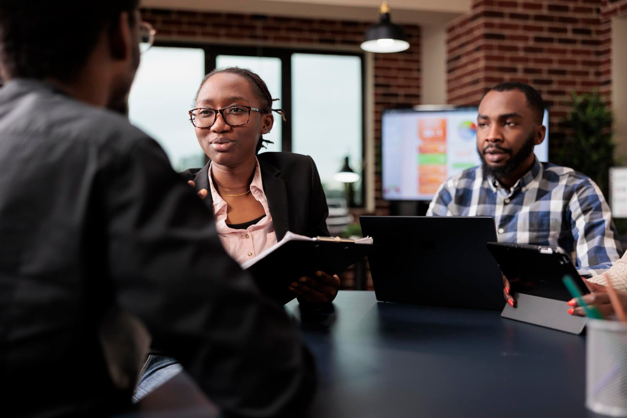 colleagues-team-working-company-paperwork-doig-teamwork-analyze-documents-online-research-information-planning-corporate-presentation-with-data-charts-job-collaboration